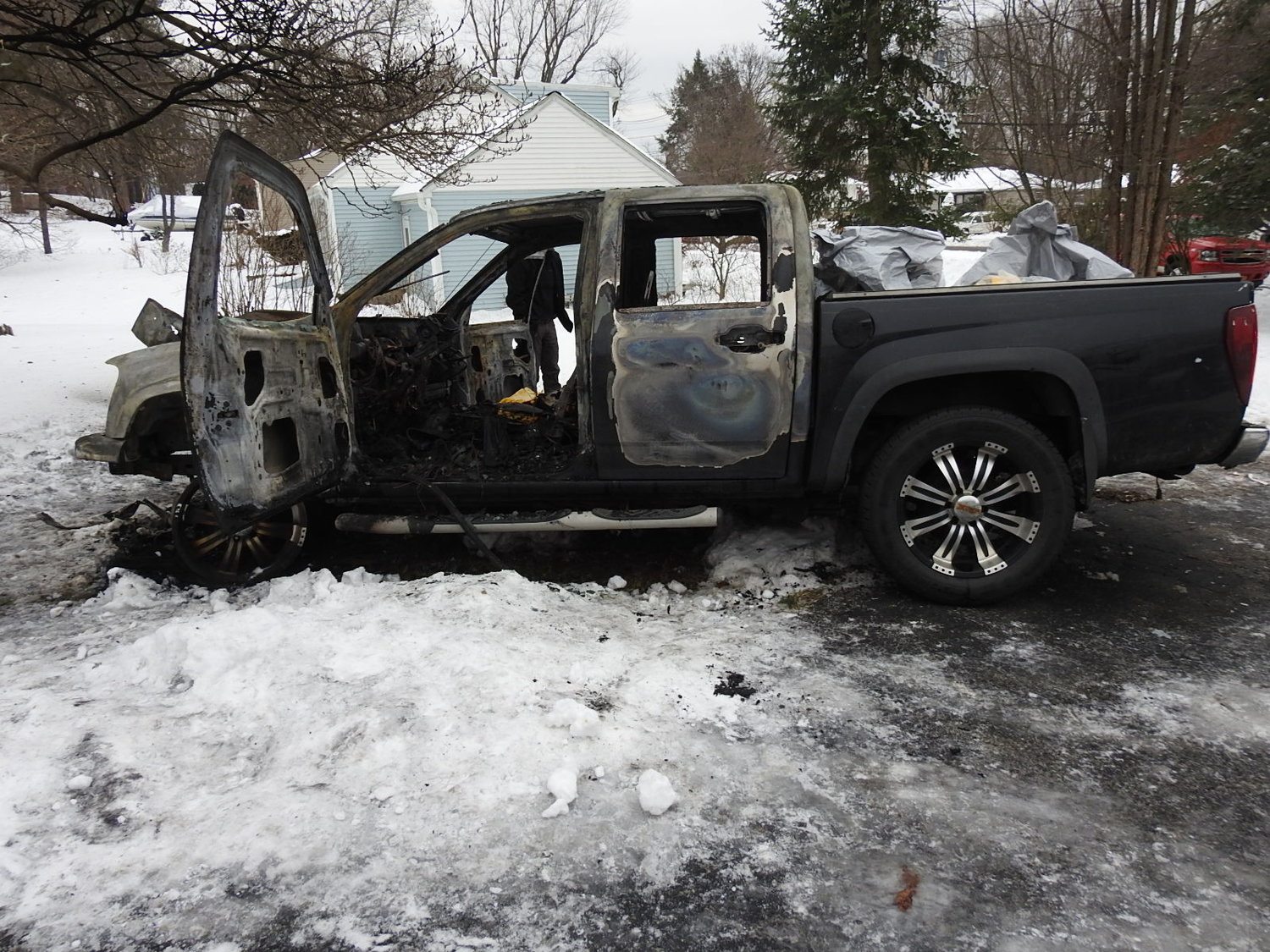 Good Will FD responded to truck fire on Gidney Ave in a driveway..After they extinguished  the fire they discovered a male subject inside the truck,