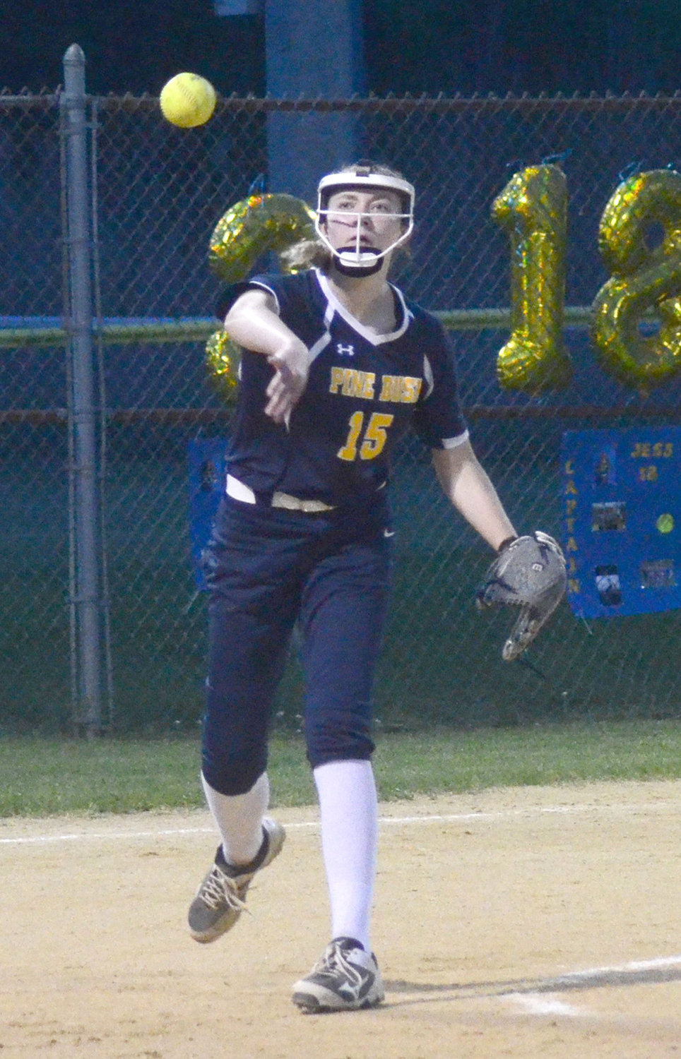 Pine Bush’s Ellie Hoppe makes a throw to first base during Wednesday’s OCIAA Division II game.