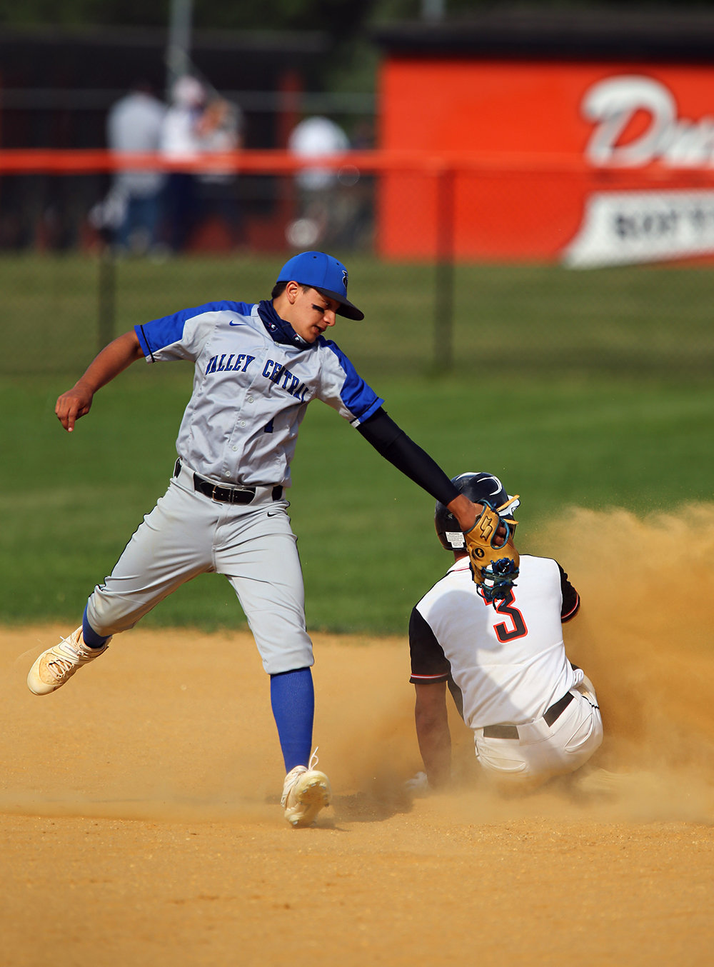 Valley Central shortstop Andrew Bonilla attempts to tag Marlboro’s Alex Grzechowski as he steals second base.