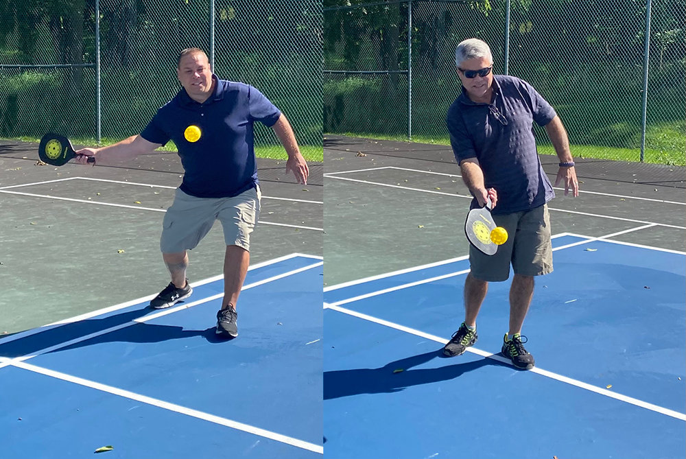Recreation Coordinator Mike Bliss (l) and Walden Mayor John Ramos (l.) exchange a volley at Bradley Park’s new pickleball court.