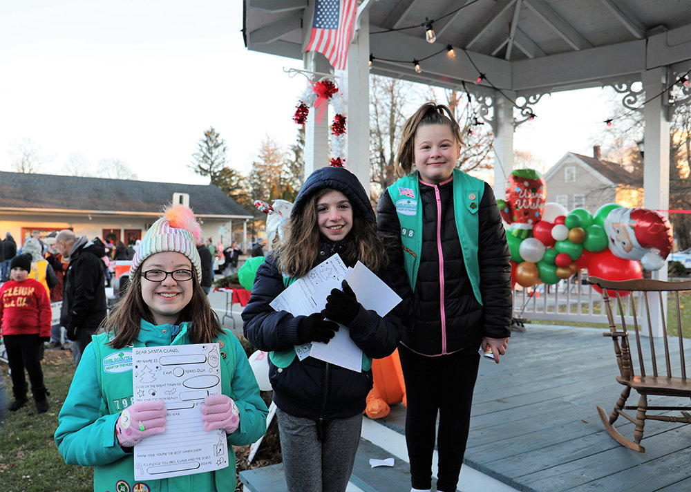 Girl Scout Troop 798 members gave out a Dear Santa activity children could do at home.
