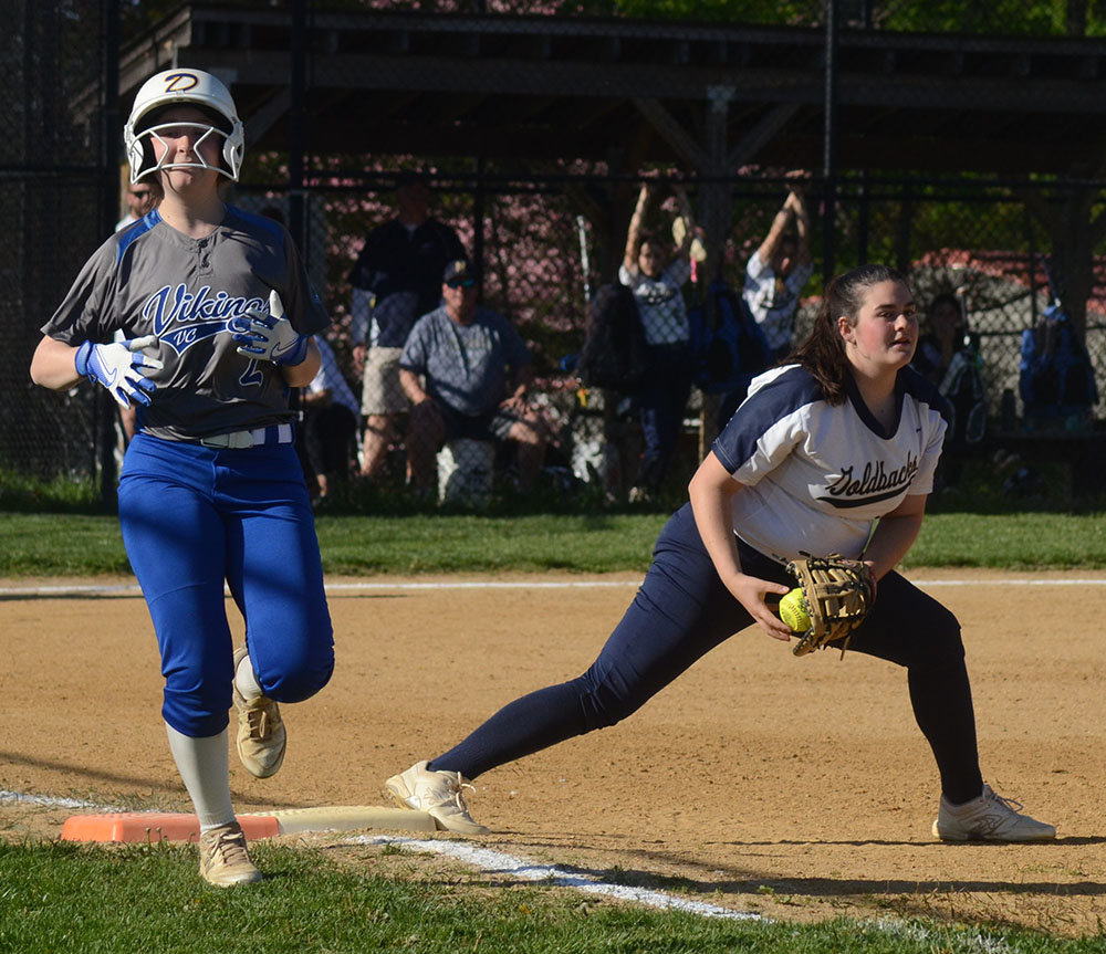 Newburgh first baseman Allison Miller looks for the call as Valley Central’s Lindsey Serrao runs through first base during a May 9 OCIAA crossover softball game at Newburgh Free Academy North.