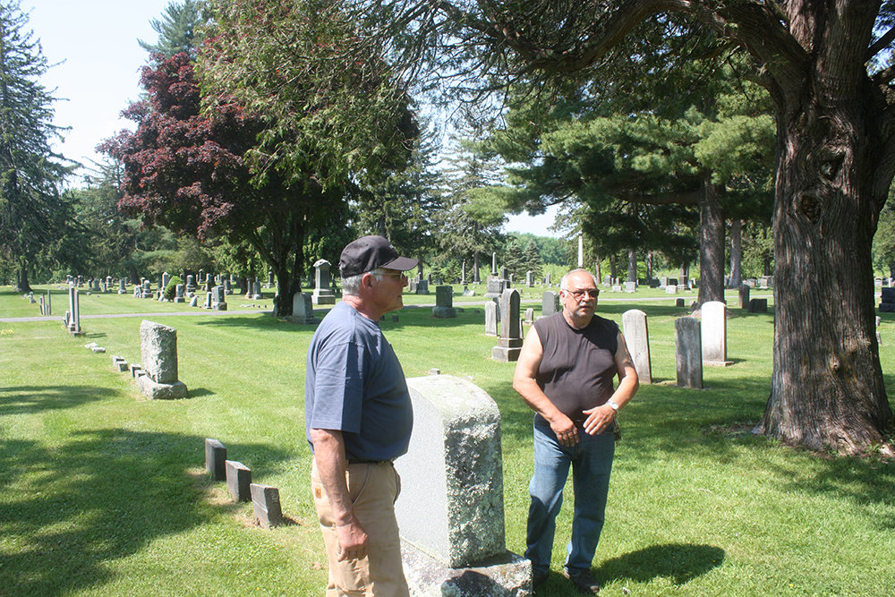 Lloyd Cemetery Trustee Dennis Bragg (l.) and Superintendent Charles Meuser would like to preserve the history of the soldiers buried there.