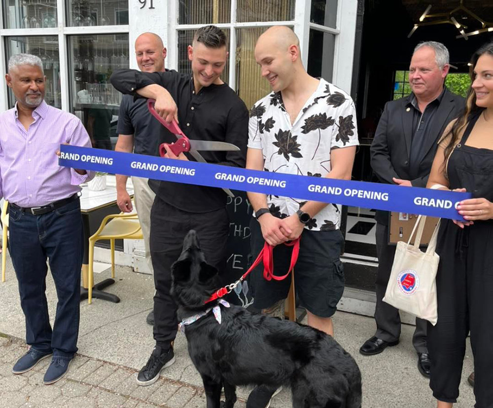 On Saturday, May 14, a special ribbon cutting ceremony was held in collaboration with the Business Council of Greater Montgomery to commemorate the official grand opening of Lady. From left to right, Lady’s Interior Designer Dave Little, Deputy Police Chief Paul Arteta, Chef Justin and Keith Lynch with their dog and Lady’s namesake “Lady”, Mayor Steve Brescia, and Elizabeth Lounsbury Sollecito on behalf of the Business Council of Greater Montgomery.