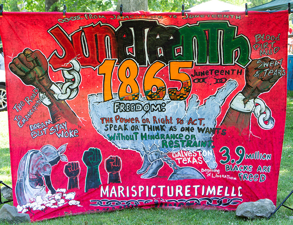 A banner depicts the history of Juneteenth.