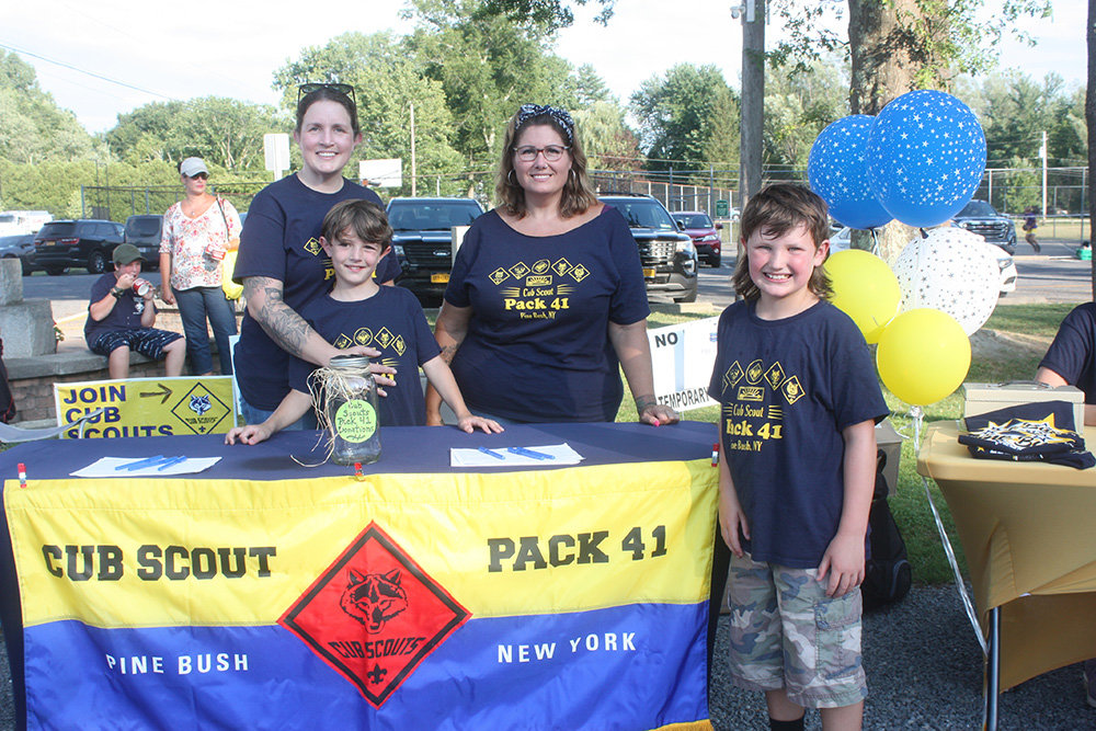 John Tobin and Gavin Dillon of Cub Scout Pack 41, with Christine Tobin and Kristen Gessel.