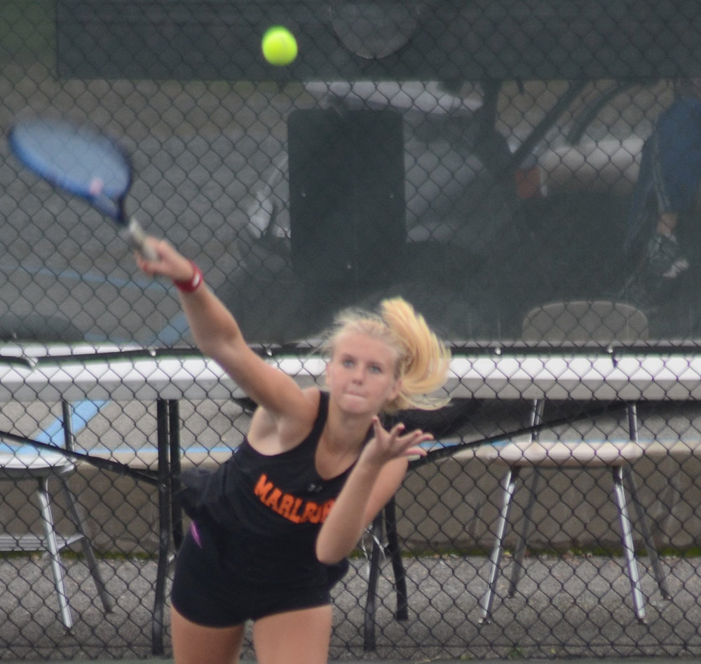 Marlboro’s Samantha Jaros serves the ball during the MHAL girls’ tennis tournament at FDR High School on Oct. 13, 2021, in Hyde Park.