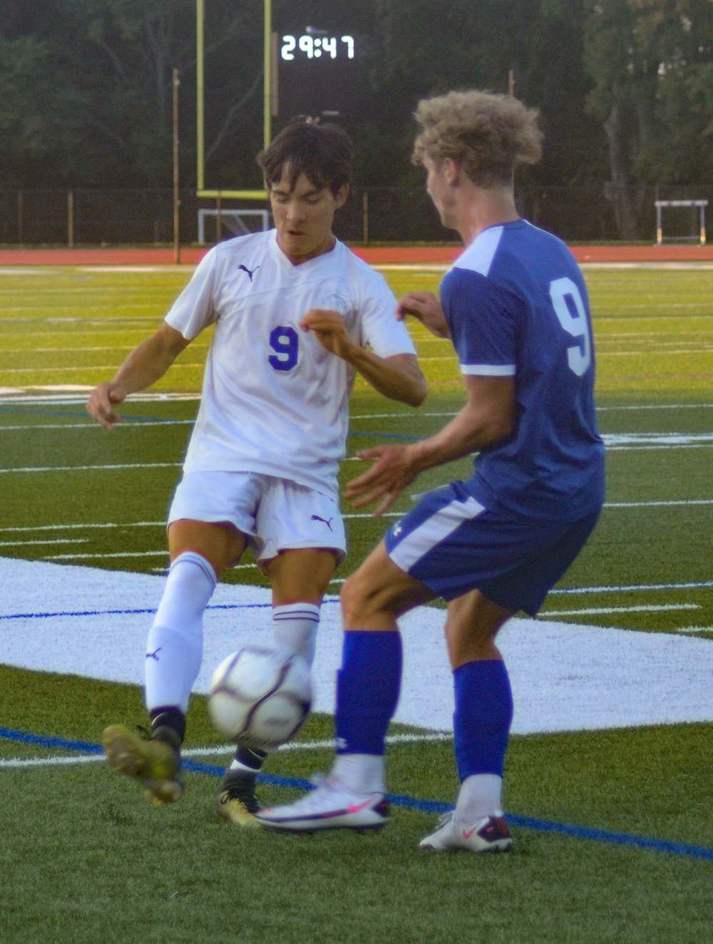 Valley Central’s Jude Remenar tries to play the ball past Goshen’s Alex Massa during Thursday’s non-league boys’ soccer game at Goshen High School.