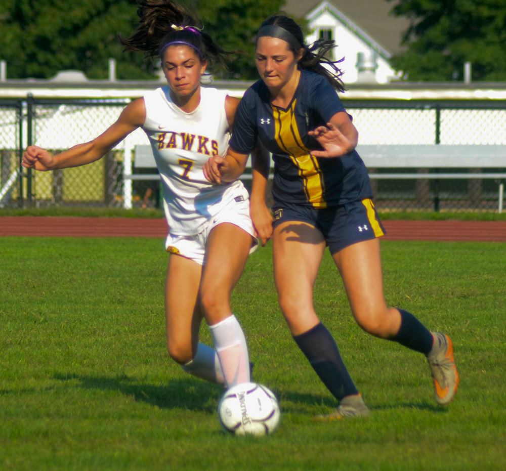 Highland’s Elizabeth Harris and Rhinebeck’s Anna Savolainen battle for the ball during Friday’s MHAL girls’ soccer game at Highland High School.