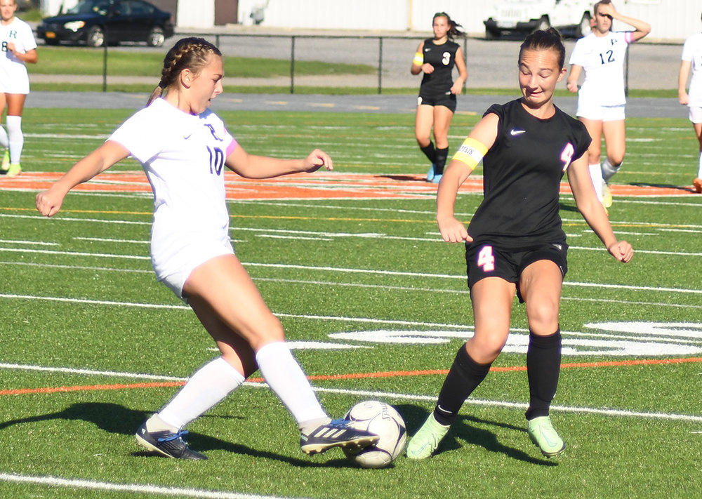 Marlboro’s Alivia Menser battles Rondout Valley’s Faith Avello for the ball during Thursday’s MHAL girls’ soccer game at Marlboro Central High School.