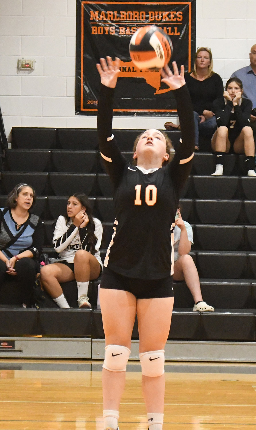 Marlboro’s Emma Stoebling sets the ball during Thursday’s MHAL volleyball match against Rondout Valley at Marlboro High School.