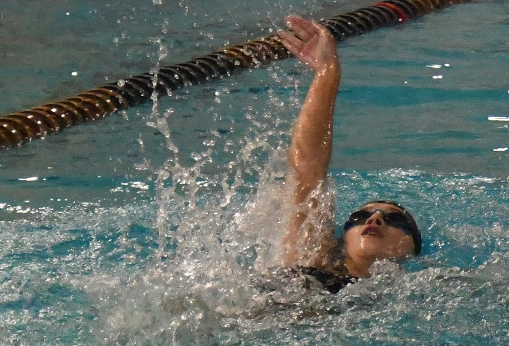 Marlboro’s Sofia Santora swims the 100-yard backstroke during an OCIAA girls’ swimming and diving meet on Sept. 19 at Newburgh Free Academy.