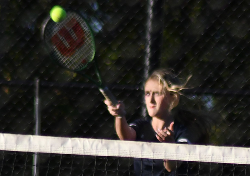 Highland’s Ella Fuller returns the ball during Friday’s MHAL girls’ tennis match against Wallkill on Friday at Wallkill Senior High School.