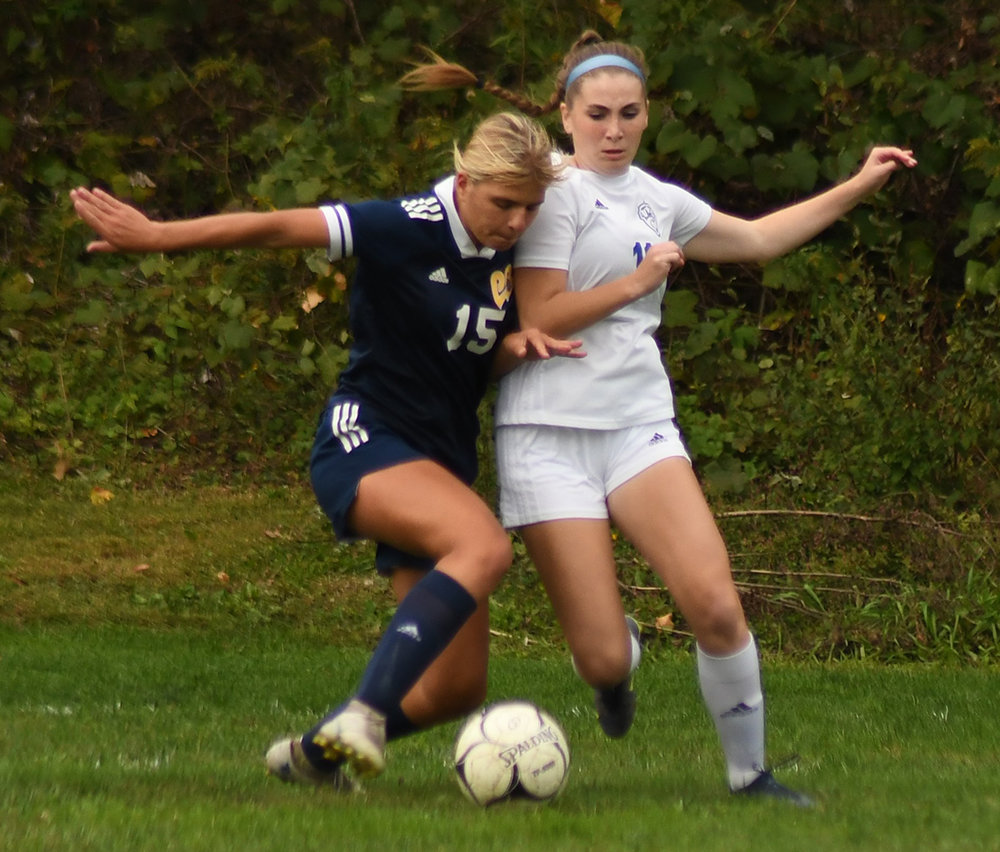 Pine Bush’s Leah Meberg battles Valley Central’s Cailin Swart for the ball during Friday’s OCIAA Division II girls’ soccer game at Pine Bush Elementary School.