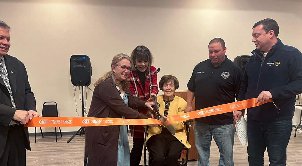 Anita Vandermark (seated) cut the ribbon last week to open the new Anita L. Vandermark Community Center in Walden.