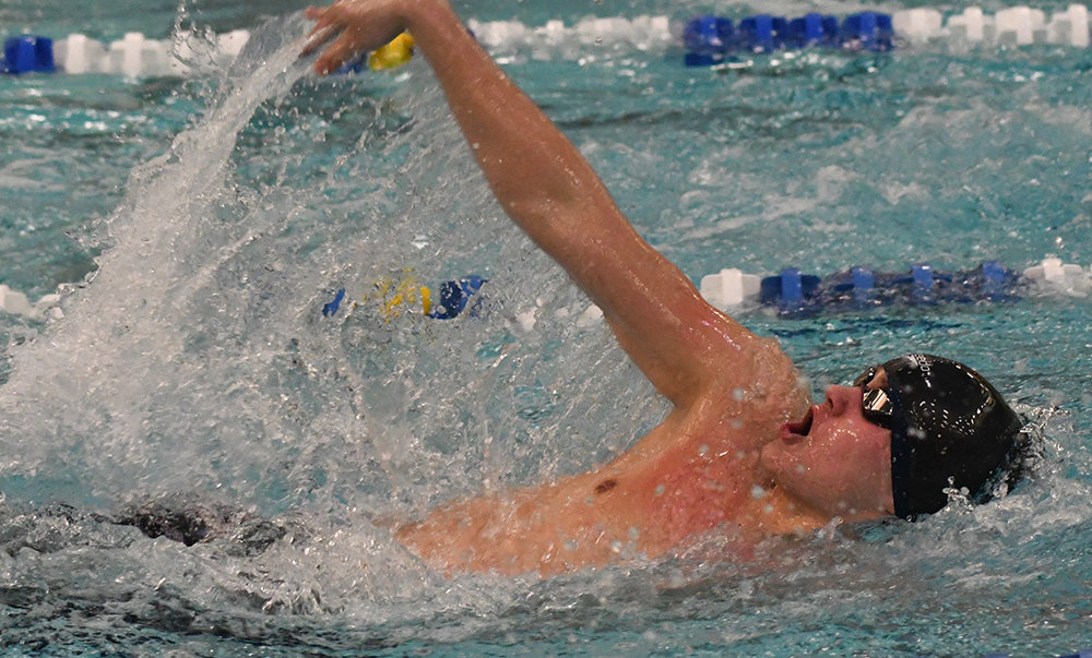 Pine Bush's Tomek Oakes swims the backstroke leg of the 200-yard individual medley during Saturday's Section 9 boys' swimming championship meet at Valley Central High School in Montgomery.