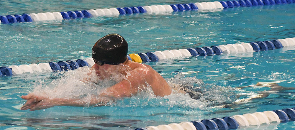 Pine Bush's Tomek Oakes swims the breaststroke leg of the 200-yard individual medley during Saturday's Section 9 boys' swimming championship meet at Valley Central High School in Montgomery.