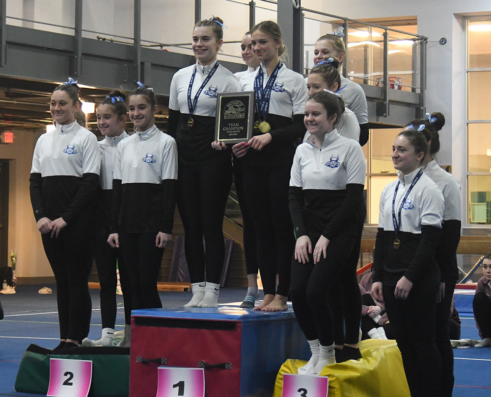The Valley Central Vikings pose with the Section 9 team championship plaque after winning the Section 9 gymnastics championships on Feb. 13 at Epik Athletics in Middletown.