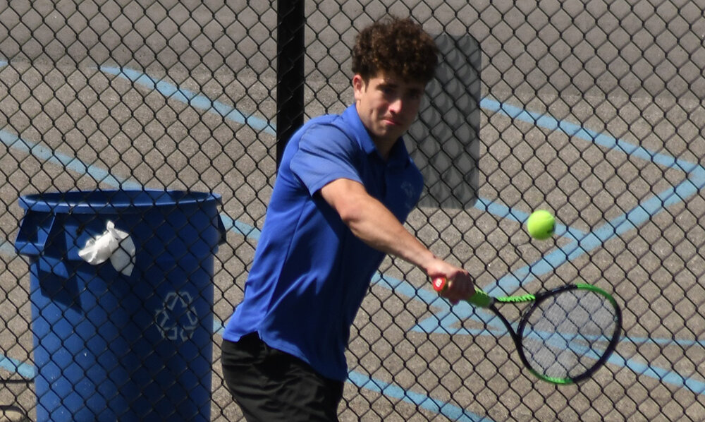 Wallkill’s J.J. Wagner responds with a backhand during Wednesday’s MHAL boys’ tennis championships at Franklin D. Roosevelt High School in Hyde Park.