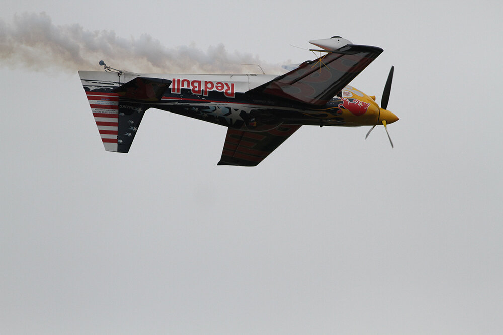 Red Bull Air Force hangs over the Wallkill River.