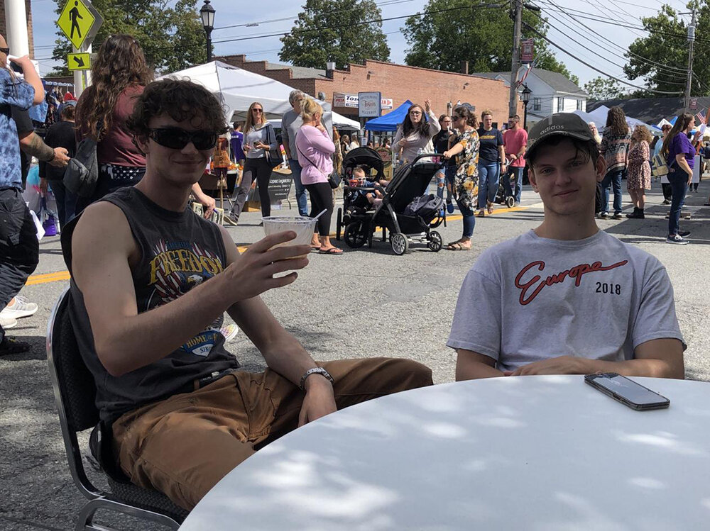 Henry Hubert and Jake Lively chilling at the festival.